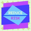 Writing note showing Reduce Risk. Business photo showcasing lessen the potential damage that could be caused by a hazard