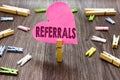 Writing note showing Referrals. Business photo showcasing Act of referring someone or something for consultation review Royalty Free Stock Photo