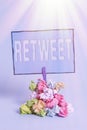 Writing note showing Retweet. Business photo showcasing in twitter repost or forward a message posted by another user Reminder