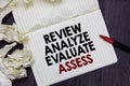 Writing note showing Review Analyze Evaluate Assess. Business photo showcasing Evaluation of performance feedback process Marker o Royalty Free Stock Photo