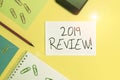 Writing note showing 2019 Review. Business photo showcasing remembering past year events main actions or good shows Royalty Free Stock Photo
