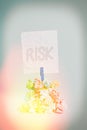 Writing note showing Risk. Business photo showcasing Possibility of losing something of value or threat of damage Reminder pile Royalty Free Stock Photo