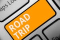 Writing note showing Road Trip. Business photo showcasing Roaming around places with no definite or exact target location Keyboard Royalty Free Stock Photo