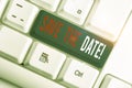 Writing note showing Save The Date. Business photo showcasing remember not schedule anything else on this day White pc keyboard Royalty Free Stock Photo