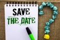 Writing note showing Save The Date. Business photo showcasing Remember not to schedule anything else that time Appointment writte Royalty Free Stock Photo