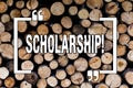 Writing note showing Scholarship. Business photo showcasing Grant or Payment made to support education Academic Study Wooden