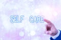 Writing note showing Self Care. Business photo showcasing practice of taking action to preserve or improve ones own health Royalty Free Stock Photo