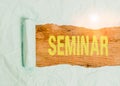 Writing note showing Seminar. Business photo showcasing Conference Academic instruction Class for small students group Cardboard