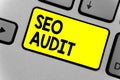 Writing note showing Seo Audit. Business photo showcasing Search Engine Optimization validating and verifying process Keyboard yel