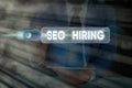Writing note showing Seo Hiring. Business photo showcasing employing a specialist will develop content to include keywords