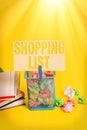 Writing note showing Shopping List. Business photo showcasing Discipline approach to shopping Basic Items to Buy Trash bin