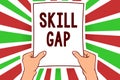 Writing note showing Skill Gap. Business photo showcasing Refering to a person's weakness or limitation of knowlege Man holding p Royalty Free Stock Photo