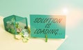 Writing note showing Solution Is Loading. Business photo showcasing thinking of way to solve big problems Diagnoses Royalty Free Stock Photo