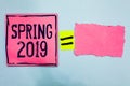 Writing note showing Spring 2019. Business photo showcasing time of year where flowers rise following winter season Pink paper not