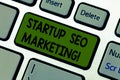 Writing note showing Startup Seo Marketing. Business photo showcasing Attract qualified leads while your work improving