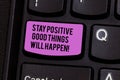 Writing note showing Stay Positive Good Things Will Happen. Business photo showcasing Keep your motivation inspiration Royalty Free Stock Photo