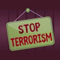 Writing note showing Stop Terrorism. Business photo showcasing Resolving the outstanding issues related to violence Memo reminder