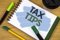 Writing note showing Tax Tips. Business photo showcasing Help Ideas for taxation Increasing Earnings Reduction on expenses Concept
