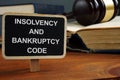 Writing note showing the text insolvency and bankruptcy code