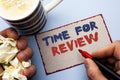 Writing note showing Time For Review. Business photo showcasing Evaluation Feedback Moment Performance Rate Assess written by Man Royalty Free Stock Photo