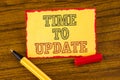 Writing note showing Time To Update. Business photo showcasing Renewal Updating Changes needed Renovation Modernization written o Royalty Free Stock Photo