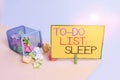 Writing note showing To Do List Sleep. Business photo showcasing Things to be done Priority object is to take a rest Royalty Free Stock Photo