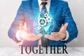 Writing note showing Together. Business photo showcasing In proximity,union or collison with another demonstrating or Royalty Free Stock Photo