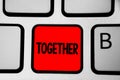 Writing note showing Together. Business photo showcasing In proximity,union or collison with another person or things Keyboard red Royalty Free Stock Photo