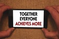 Writing note showing Together Everyone Achieves More. Business photo showcasing Teamwork Cooperation Attain Acquire Success Man h