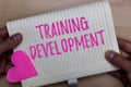 Writing note showing Training Development. Business photo showcasing Learn and Expand skills and knowledge Program Man Royalty Free Stock Photo