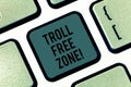 Writing note showing Troll Free Zone. Business photo showcasing Social network where tolerance and good behavior is a