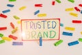 Writing note showing Trusted Brand. Business photo showcasing Consumer believe in the integrity and the ability of the brand