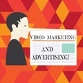 Writing note showing Video Marketing And Advertising. Business photo showcasing Promotion campaign optimization strategy Man with Royalty Free Stock Photo