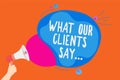 Writing note showing What Our Clients Say.... Business photo showcasing your customer feedback using poll or written paper Man hol Royalty Free Stock Photo