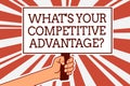 Writing note showing What s is Your Competitive Advantage question. Business photo showcasing Marketing strategy Plan Man hand hol