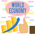 Writing note showing World Economy. Business photo showcasing Global Worldwide International markets trade money exchange Thumb Up