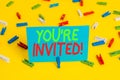 Writing note showing You Re Invited. Business photo showcasing make a polite friendly request to someone go somewhere Colored Royalty Free Stock Photo