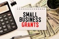 Writing note shows the text Small Business Grants