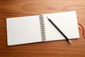 Writing on Notebook With black Pencil Royalty Free Stock Photo