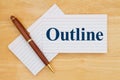 Writing an outline message with retro white paper index cards with pen Royalty Free Stock Photo