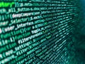 Writing programming code on laptop. Close up of computer web page code inside of html file. Abstract source code background. Real Royalty Free Stock Photo