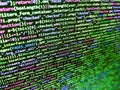 Writing programming code on laptop. Developer working on software codes in office. Concept of security, programming and hacking, Royalty Free Stock Photo
