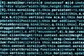 Writing programming code on laptop. Digital binary data on computer screen Royalty Free Stock Photo