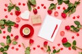 Writing prompts for Valentine`s day. Flat lay with red roses, coffee cup, present, hearts and blank notebook on pink background. Royalty Free Stock Photo