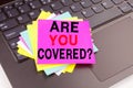 Writing Question Are you Covered text made in office close-up on laptop computer keyboard. Business concept for Travel Insurance H Royalty Free Stock Photo