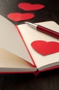 Writing romantic poem or text in notebook