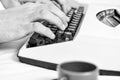 Writing routine. Vintage typewriter concept. Hands typing retro writing machine. Old typewriter and authors hands. Male Royalty Free Stock Photo