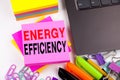 Writing showing Energy Efficiency made in the office with surroundings laptop marker pen. Business concept for Building Technology Royalty Free Stock Photo