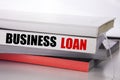 Writing text showing Business Loan. Business concept for Lending Finance Credit written on the book on the white background.