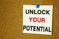 A writing text showing concept of Unlock Your Potential made on sticky note handwritten letters words for Self-Development Improve Royalty Free Stock Photo